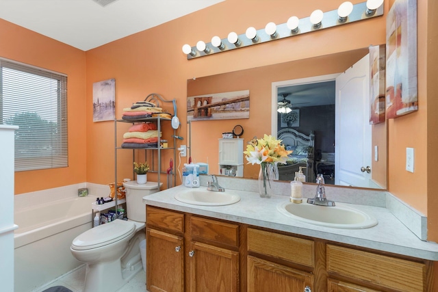 36438 Dominion Cir, Sterling Heights, MI 48310 - bathroom with a garden tub, double vanity, a ceiling fan, toilet, and tile patterned floors