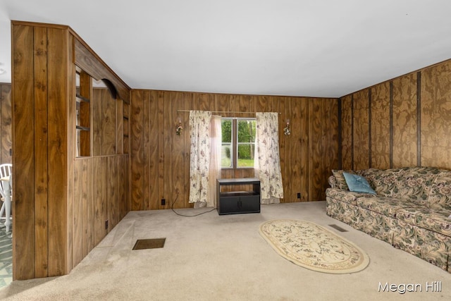 3570 109th Ave, Allegan, MI 49010 - unfurnished living room featuring carpet flooring and wooden walls