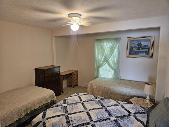 8862 W Rainbow Lake Dr, Baldwin, MI 49304 - bedroom with light carpet and ceiling fan