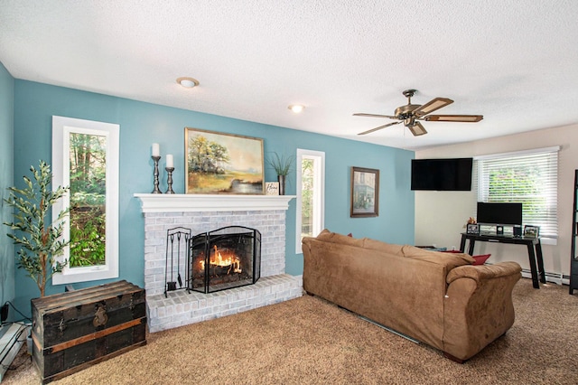 2290 Blissfield Ct, Muskegon, MI 49441 - carpeted living area with a brick fireplace, ceiling fan, a textured ceiling, and a baseboard heating unit