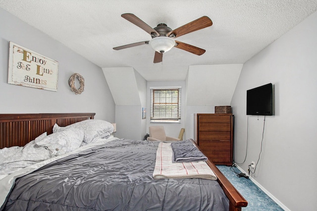 2290 Blissfield Ct, Muskegon, MI 49441 - carpeted bedroom featuring a textured ceiling, lofted ceiling, a ceiling fan, and baseboards