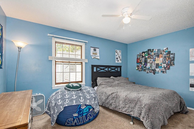 2290 Blissfield Ct, Muskegon, MI 49441 - carpeted bedroom featuring a textured ceiling and ceiling fan