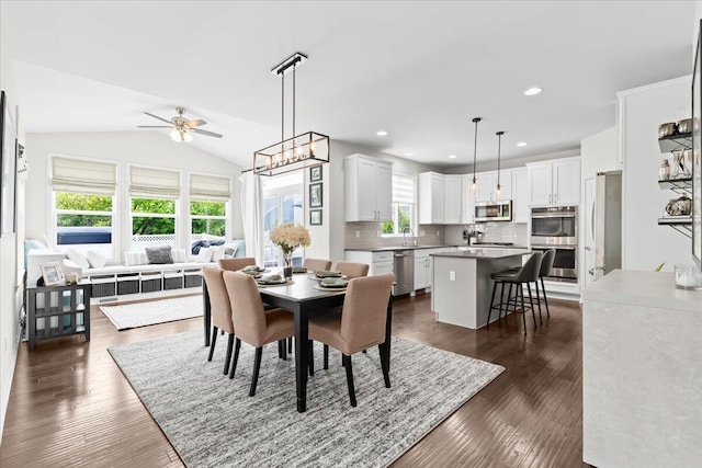 310 Fletcher St, Wixom, MI 48393 - dining room featuring a ceiling fan, dark wood-style flooring, lofted ceiling, and recessed lighting