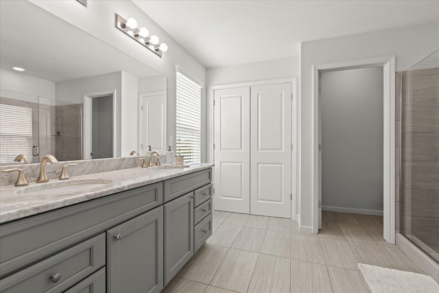 310 Fletcher St, Wixom, MI 48393 - full bath with double vanity, a tile shower, and tile patterned floors