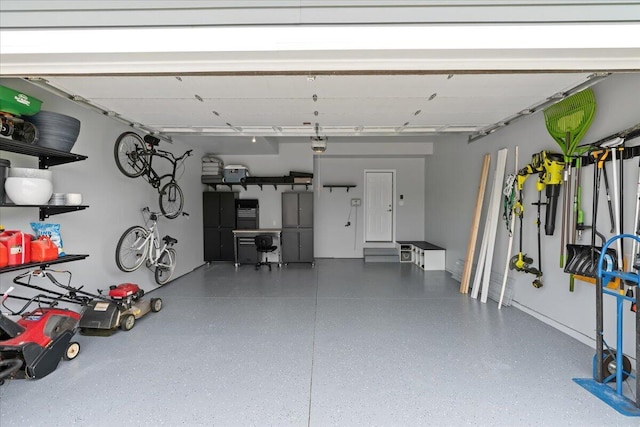 310 Fletcher St, Wixom, MI 48393 - garage featuring a garage door opener