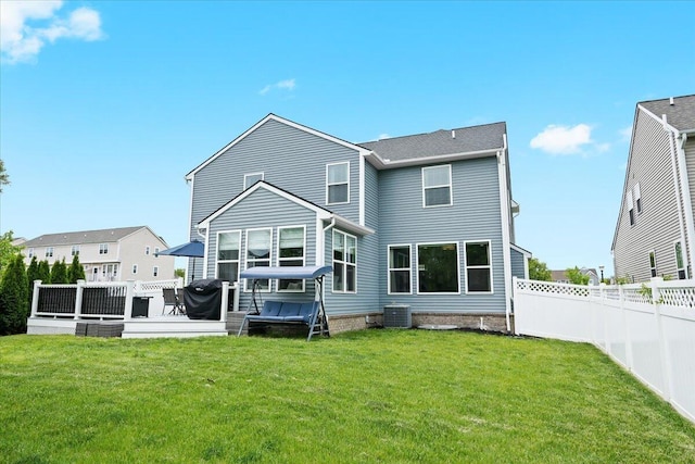 310 Fletcher St, Wixom, MI 48393 - back of house with cooling unit and a wooden deck