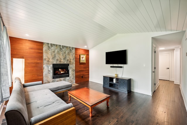 6185 N Shore Dr, Coloma, MI 49038 - living area with a stone fireplace, wooden walls, baseboards, wood finished floors, and lofted ceiling