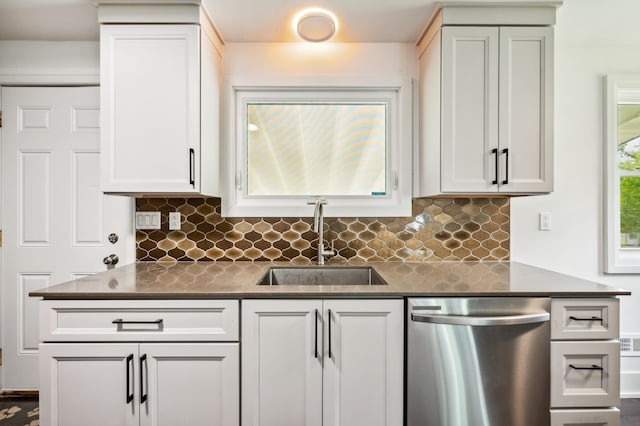 6185 N Shore Dr, Coloma, MI 49038 - kitchen with dishwasher, a sink, dark countertops, and tasteful backsplash