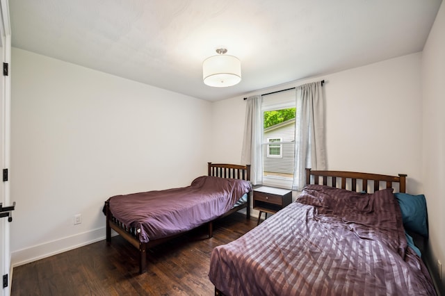 6185 N Shore Dr, Coloma, MI 49038 - bedroom featuring wood finished floors and baseboards