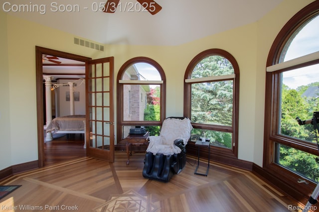 72755 Solanus Dr, Bruce, MI 48065 - living area featuring plenty of natural light and baseboards