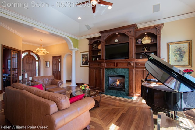 72755 Solanus Dr, Bruce, MI 48065 - living area featuring arched walkways, a ceiling fan, ornamental molding, a fireplace, and decorative columns