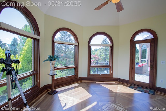 72755 Solanus Dr, Bruce, MI 48065 - workout area with ceiling fan, healthy amount of natural light, baseboards, and high vaulted ceiling
