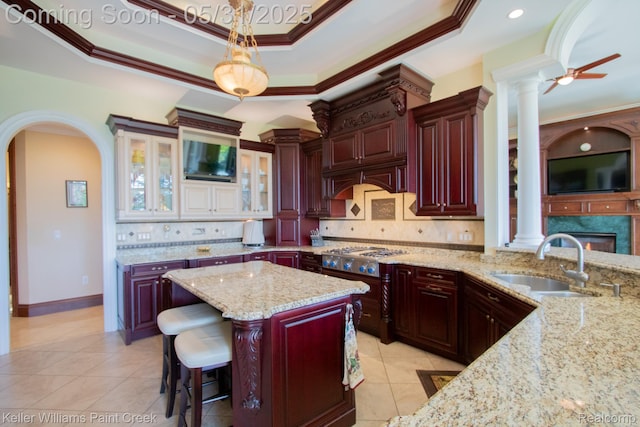 72755 Solanus Dr, Bruce, MI 48065 - kitchen featuring decorative columns, a sink, ornamental molding, light tile patterned flooring, and backsplash