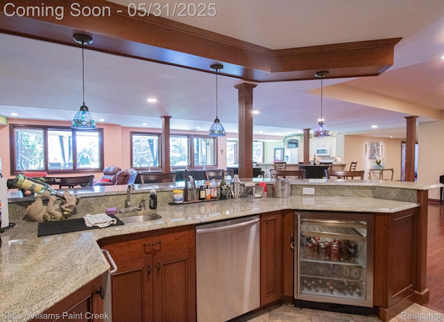 72755 Solanus Dr, Bruce, MI 48065 - indoor bar featuring stainless steel dishwasher, beverage cooler, ornate columns, pendant lighting, and recessed lighting