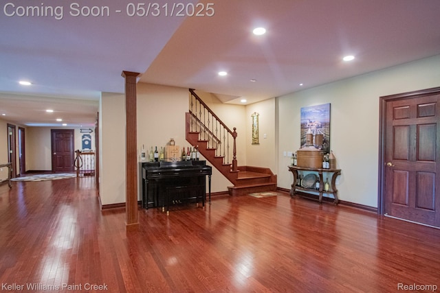 72755 Solanus Dr, Bruce, MI 48065 - entrance foyer with wood finished floors, stairs, recessed lighting, and baseboards
