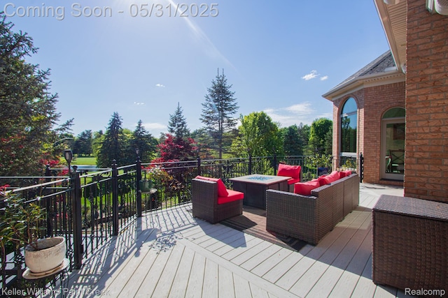 72755 Solanus Dr, Bruce, MI 48065 - wooden terrace featuring an outdoor living space with a fire pit