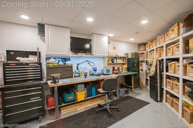 72755 Solanus Dr, Bruce, MI 48065 - office space with a workshop area, finished concrete flooring, a drop ceiling, and recessed lighting