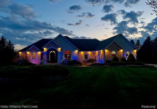 72755 Solanus Dr, Bruce, MI 48065 - view of front of property featuring a lawn and brick siding
