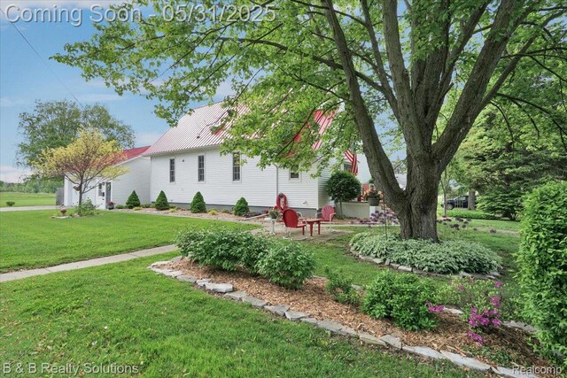6624 Jefferson Rd, North Branch, MI 48461 - view of grassy yard with a patio area