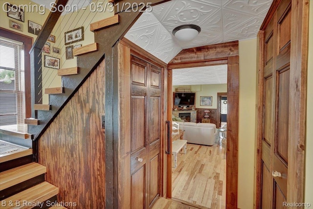 6624 Jefferson Rd, North Branch, MI 48461 - stairs with wood finished floors and wooden walls