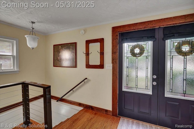 6624 Jefferson Rd, North Branch, MI 48461 - foyer entrance featuring wood finished floors, french doors, and baseboards