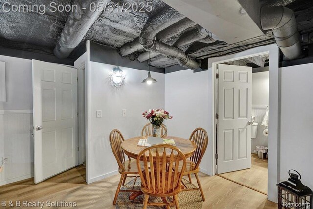 6624 Jefferson Rd, North Branch, MI 48461 - dining space with light wood-style flooring and baseboards
