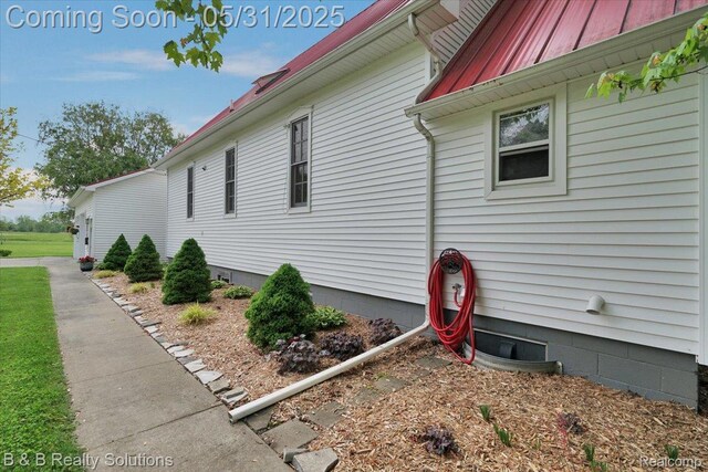 6624 Jefferson Rd, North Branch, MI 48461 - view of property exterior with a standing seam roof and metal roof