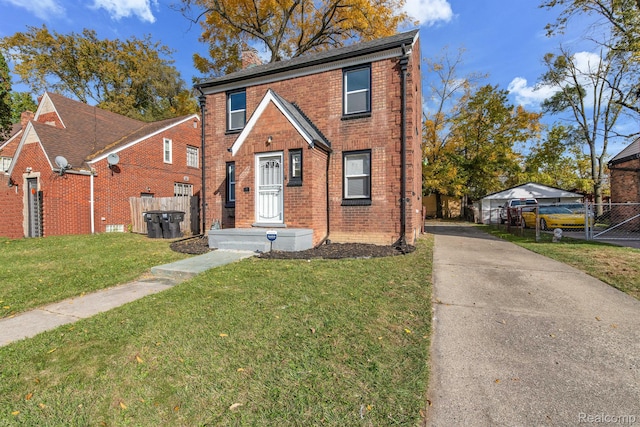 15480 Asbury Park, Detroit, MI 48227 - view of front of house with brick siding and concrete driveway