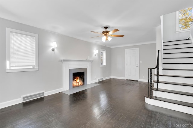 15480 Asbury Park, Detroit, MI 48227 - unfurnished living room featuring stairs, a fireplace with flush hearth, ceiling fan, wood finished floors, and baseboards