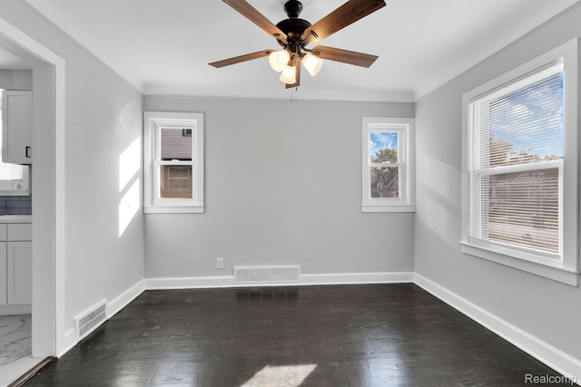 15480 Asbury Park, Detroit, MI 48227 - spare room featuring ceiling fan, baseboards, and wood finished floors