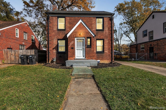 15480 Asbury Park, Detroit, MI 48227 - view of front of home with brick siding, a chimney, and roof with shingles