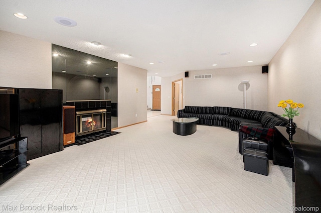 5322 Pond Bluff Dr, West Bloomfield, MI 48323 - living room featuring light colored carpet, a tile fireplace, and recessed lighting