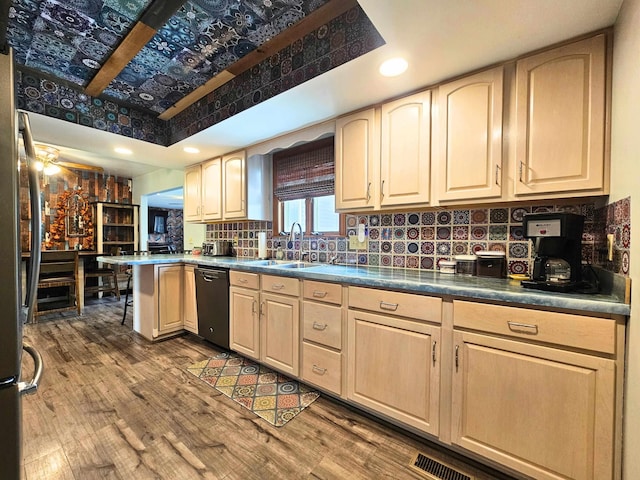 10040 S Reese Rd, Birch Run, MI 48415 - kitchen featuring dishwasher, a sink, light brown cabinets, a peninsula, and recessed lighting