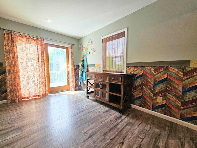 10040 S Reese Rd, Birch Run, MI 48415 - living area featuring wood finished floors, healthy amount of natural light, a wainscoted wall, and recessed lighting