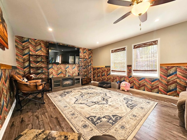 10040 S Reese Rd, Birch Run, MI 48415 - living room featuring wallpapered walls, a wainscoted wall, ceiling fan, wood finished floors, and recessed lighting