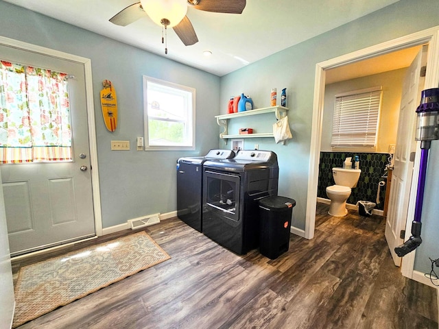 10040 S Reese Rd, Birch Run, MI 48415 - washroom featuring independent washer and dryer, baseboards, a ceiling fan, and dark wood-style flooring
