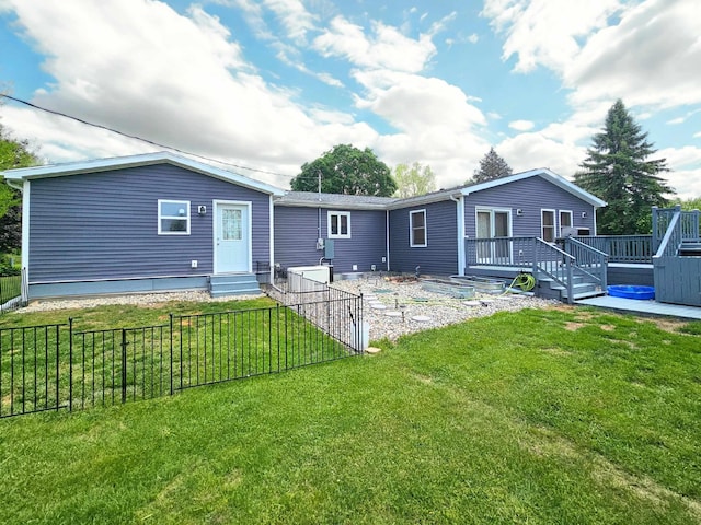 10040 S Reese Rd, Birch Run, MI 48415 - rear view of house featuring a wooden deck