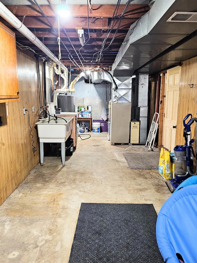 10040 S Reese Rd, Birch Run, MI 48415 - unfinished basement featuring a sink and heating unit