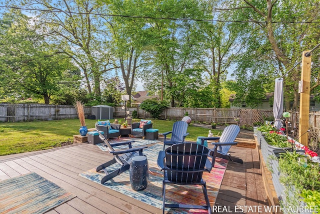 38 W 31st St, Holland, MI 49423 - wooden deck with a fire pit