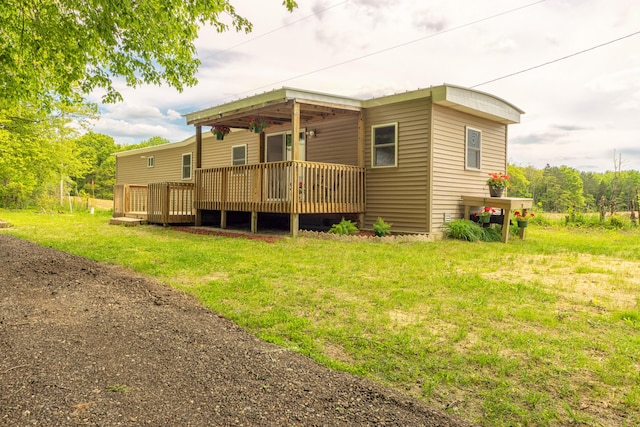 3687 111th Ave, Allegan, MI 49010 - rear view of property with a deck