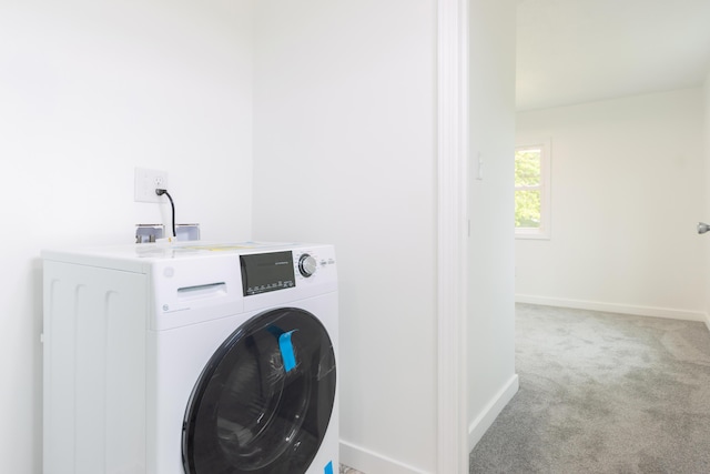 3687 111th Ave, Allegan, MI 49010 - washroom with washer / dryer, carpet floors, and baseboards