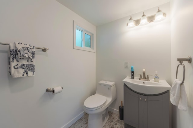 3687 111th Ave, Allegan, MI 49010 - half bath featuring vanity, toilet, and baseboards