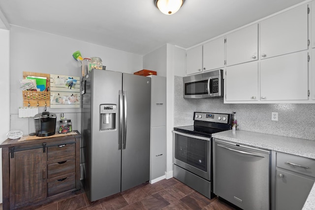 113 Greenleaf St, Onsted, MI 49265 - kitchen featuring stainless steel appliances, light countertops, and white cabinetry