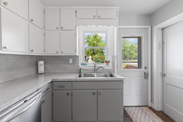 113 Greenleaf St, Onsted, MI 49265 - kitchen with dishwasher, a sink, gray cabinets, light countertops, and dark wood finished floors
