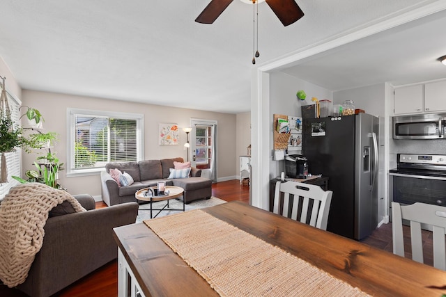 113 Greenleaf St, Onsted, MI 49265 - dining space featuring dark wood-style flooring, ceiling fan, and baseboards