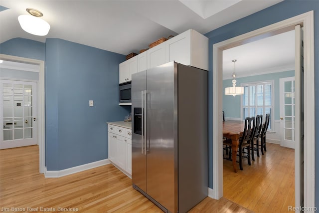480 Fisher Rd, Grosse Pointe Farms, MI 48230 - kitchen featuring appliances with stainless steel finishes, light wood-style floors, white cabinets, baseboards, and ornamental molding