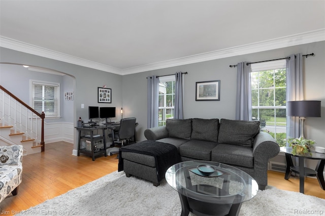 480 Fisher Rd, Grosse Pointe Farms, MI 48230 - living area featuring light wood-style floors, stairs, crown molding, arched walkways, and an office area