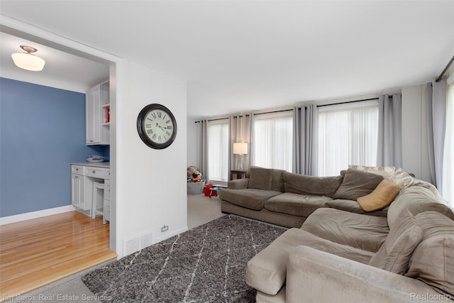 480 Fisher Rd, Grosse Pointe Farms, MI 48230 - living room featuring baseboards and light wood-type flooring
