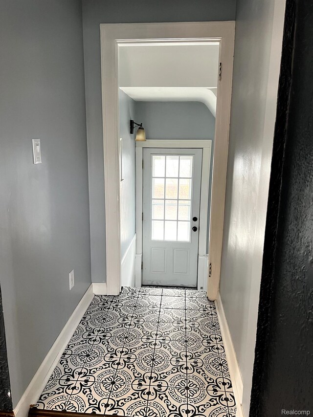 717 W 12 Mile Rd, Royal Oak, MI 48073 - doorway to outside with baseboards and tile patterned floors