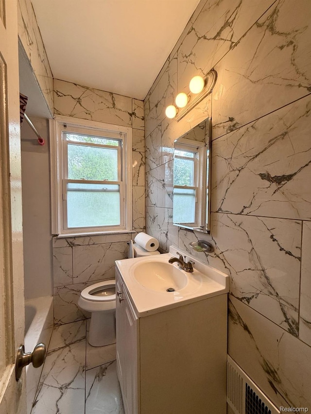 6507 Penrod St, Dearborn, MI 48228 - bathroom featuring healthy amount of natural light, vanity, marble finish floors, and toilet